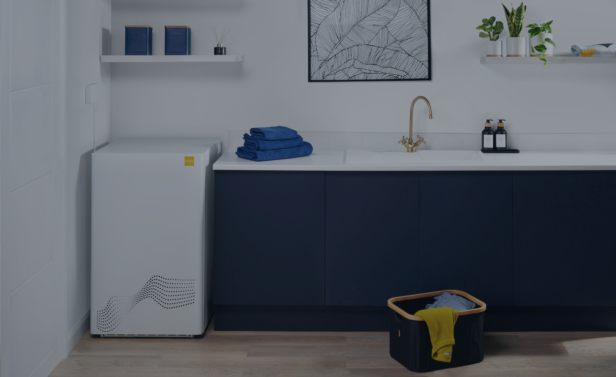 Faded photo of a kitchen with a tepeo Zero Emission Boiler in the centre